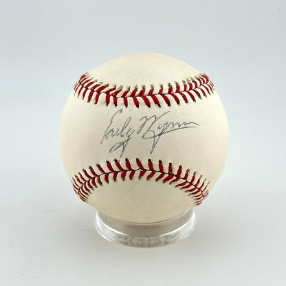 Baseball with a signature on a white background