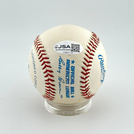 Baseball with Rawlings logo and authentication label on a gray background