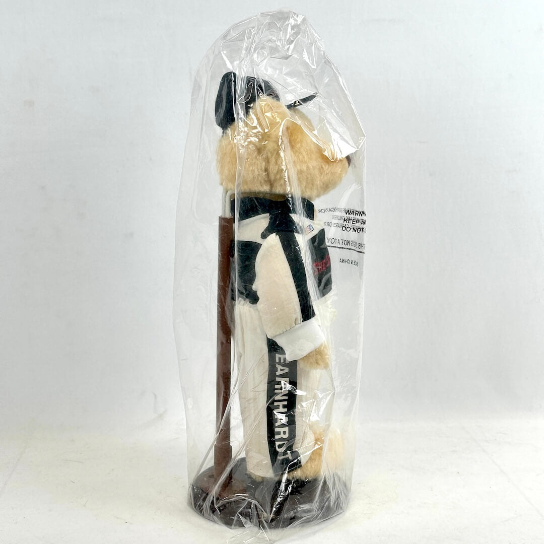 Plush toy in a clear plastic bag on a white background