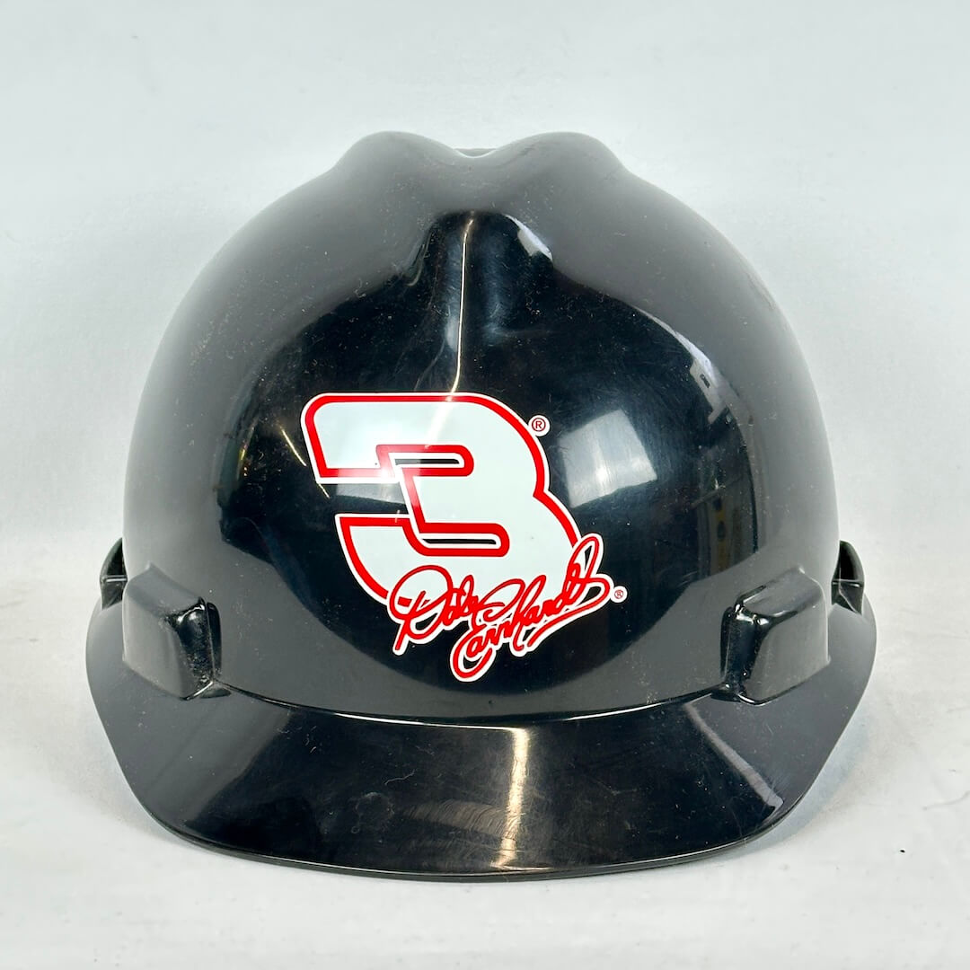 Black hard hat with a red and white logo on a white background
