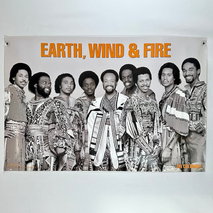 Poster of Earth, Wind & Fire band members with their names in orange text on a white background.