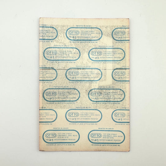 Backside of pass showing intact paper backing and mint condition. 