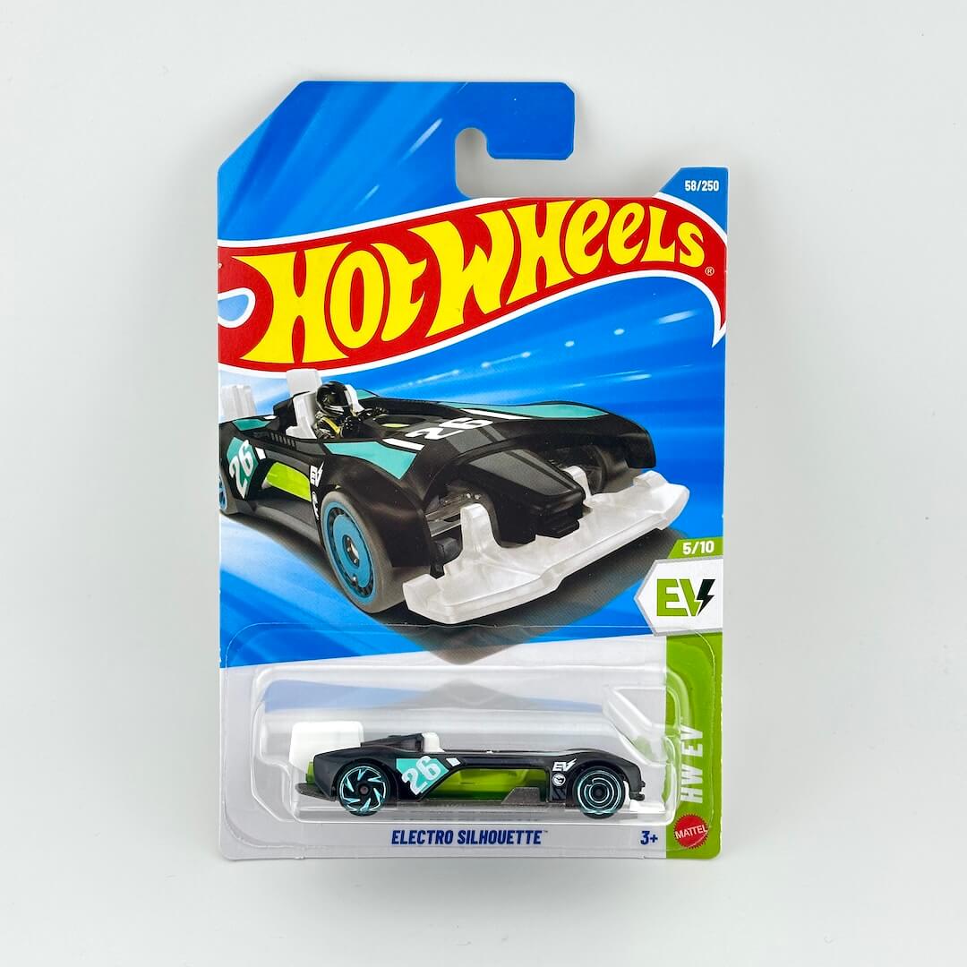 A Hot Wheels EV series Electro Silhouette toy car in its original blister card packaging, featuring a black and teal race car design.