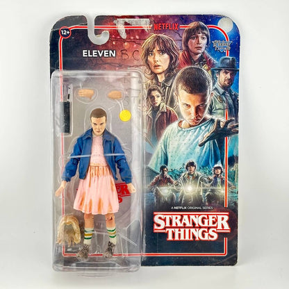 Stranger Things Eleven action figure in its original blister card packaging.