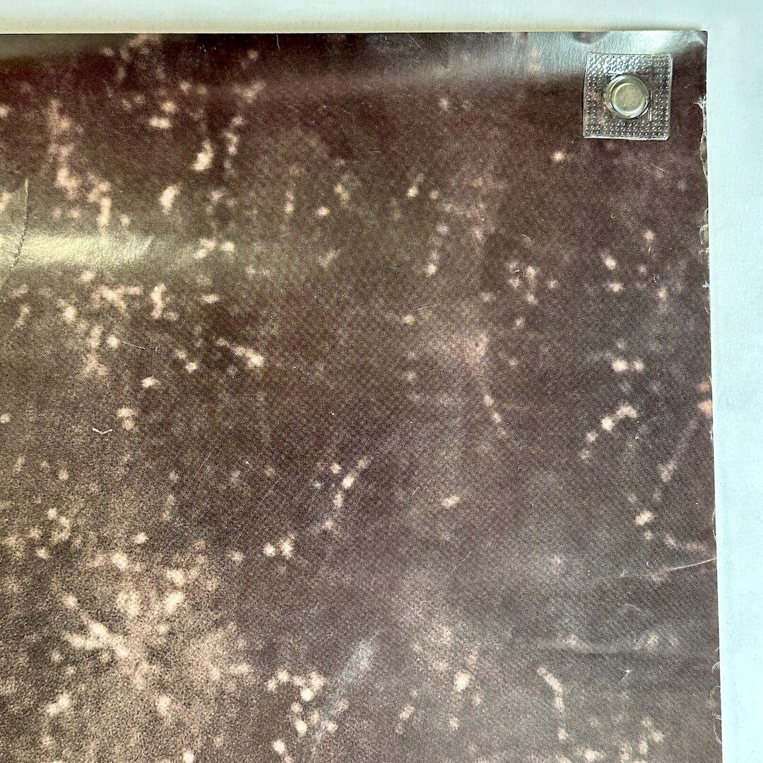 Top right corner with some wear. 