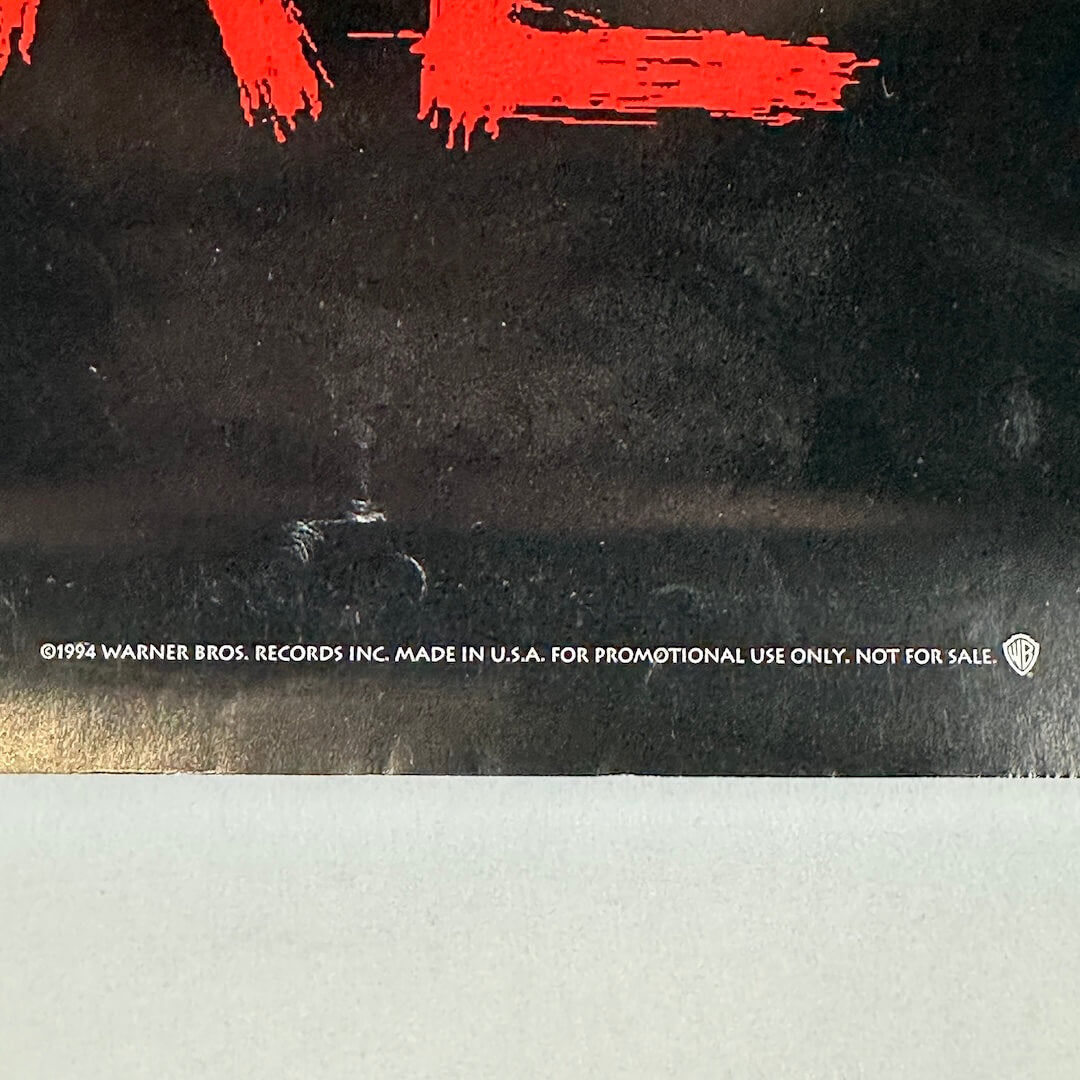 Close-up of promo and copyright information at bottom center of poster. 
