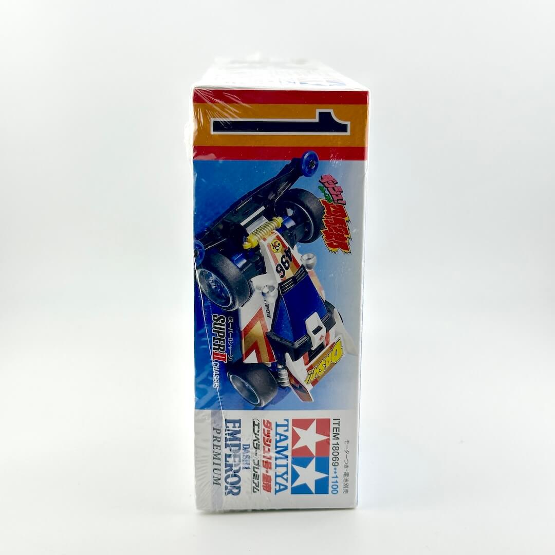 Side view of model kit packaging on white background. 