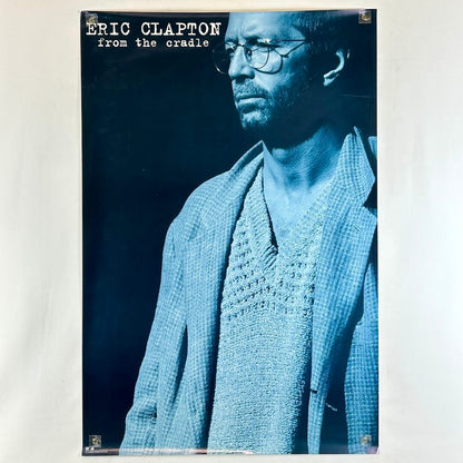 Promo poster for 'From the Cradle' by Eric Clapton with a blue-toned portrait of the artist.
