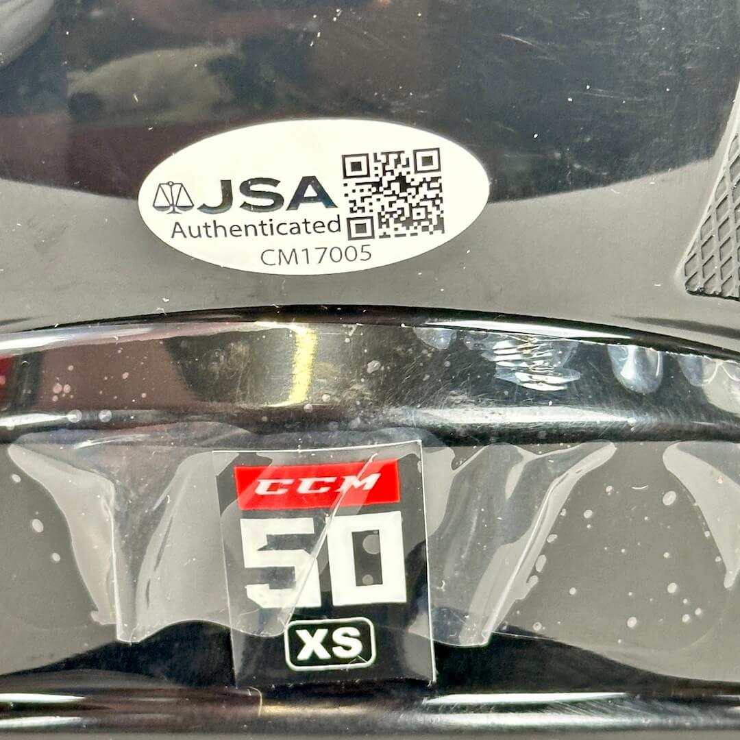 JSA authenticated sticker on a hockey helmet. 