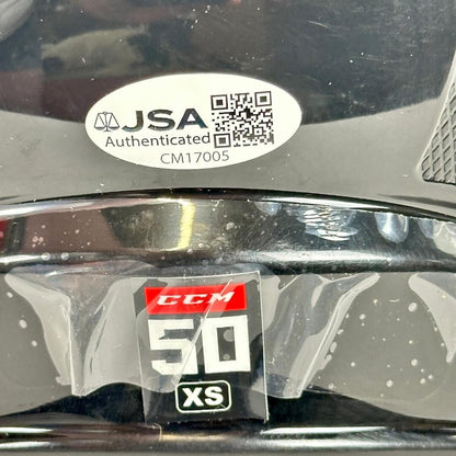 JSA authenticated sticker on a hockey helmet. 