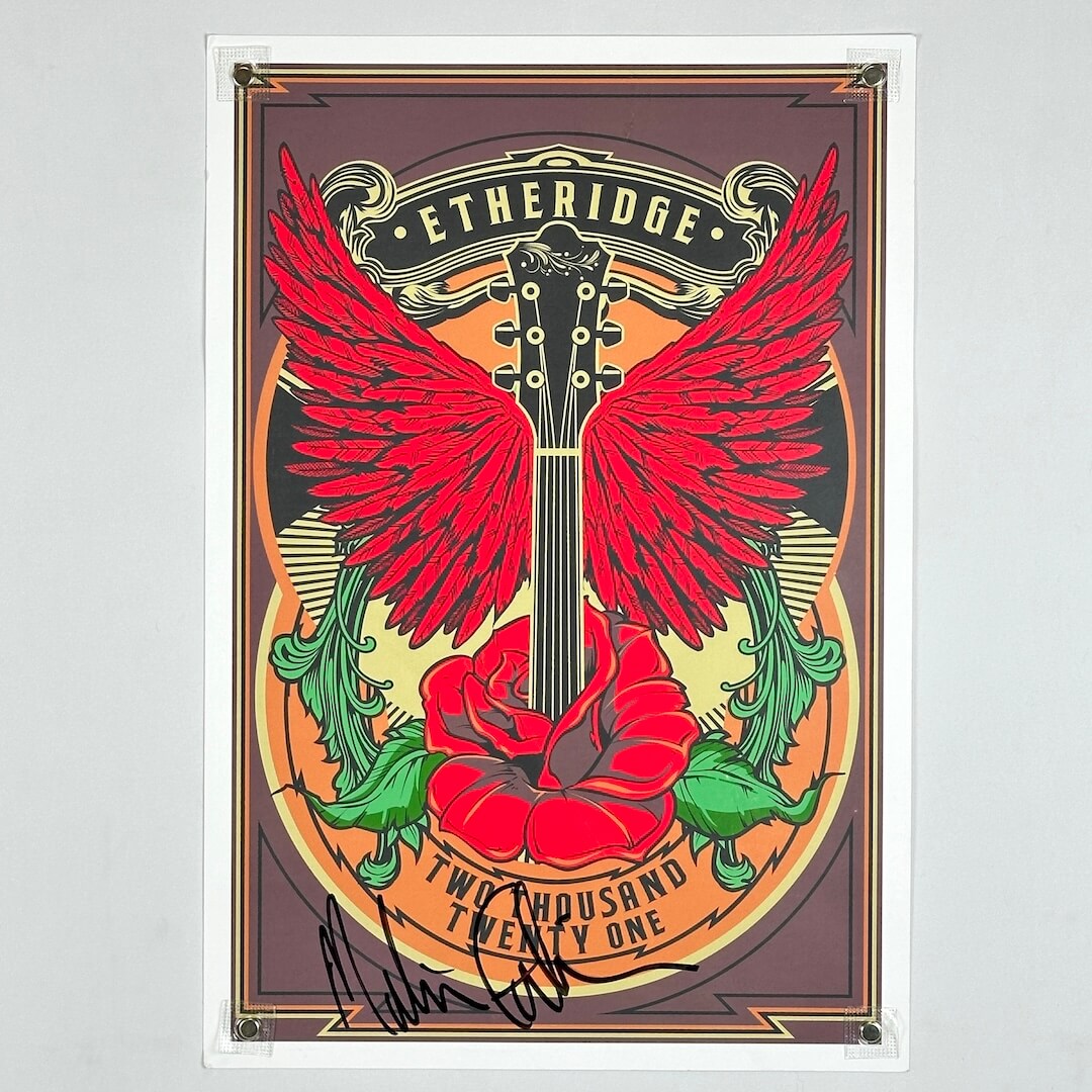 Poster with guitar design, red wings, and rose on a gray background