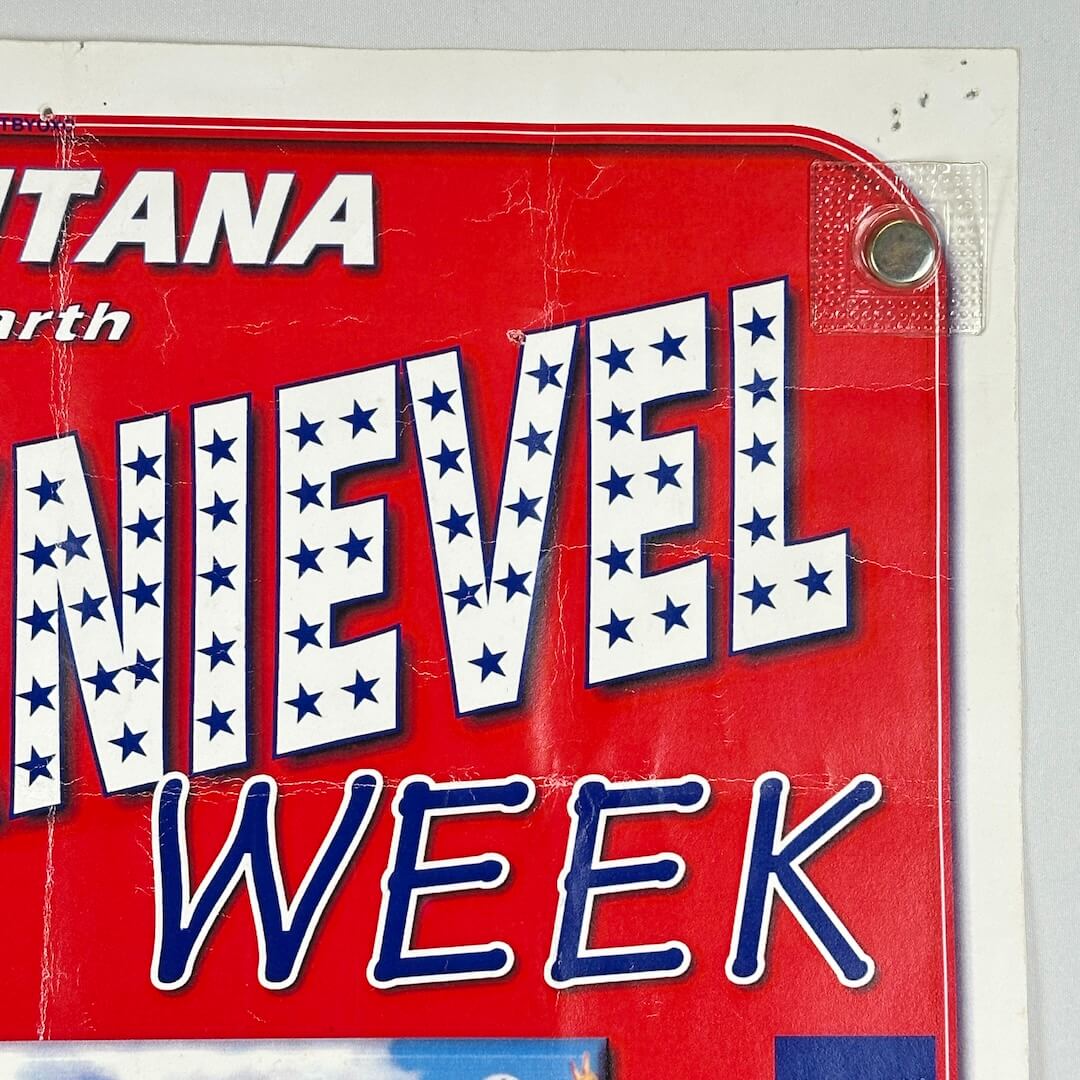 Vintage-style sign with 'KNIEVEL WEEK' text on a red background