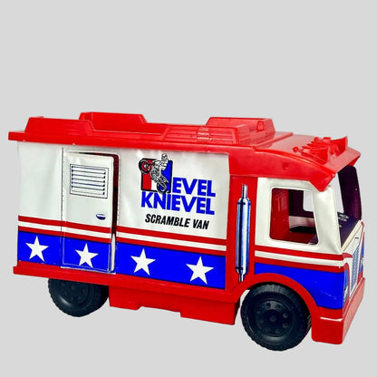 Toy vehicle with Evel Knievel branding on a white background