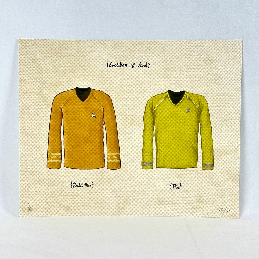 A square canvas print featuring a hand-drawn comparison of two Star Trek uniforms on a beige background. 