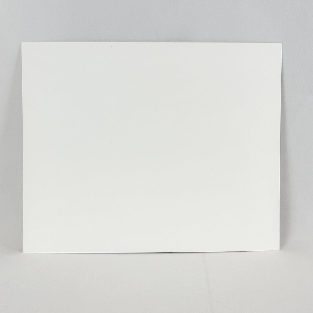 Reverse side of print. A plain white square displayed against a plain white background. 
