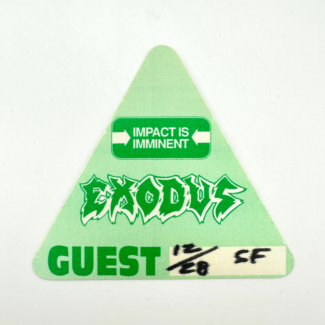 A green triangular patch with the word 'EXODUS' in stylized green and white lettering.