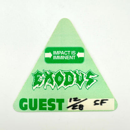 A green triangular patch with the word 'EXODUS' in stylized green and white lettering.