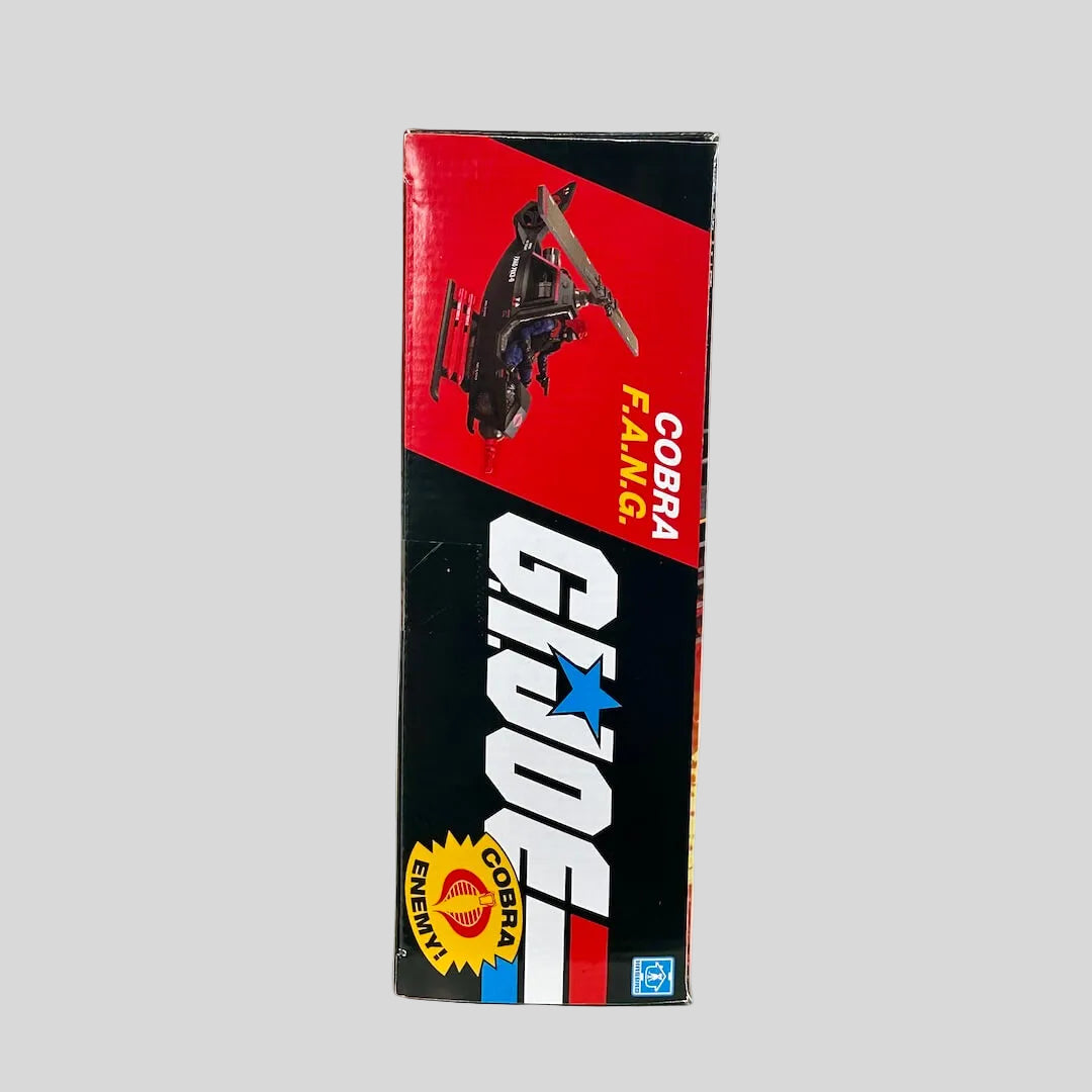 GI Joe vehicle packaging side view on light background. 