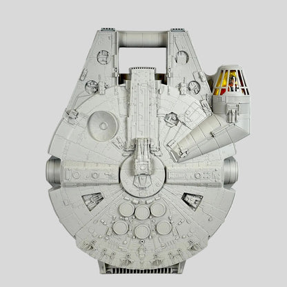Model of the Millennium Falcon spaceship on a white background
