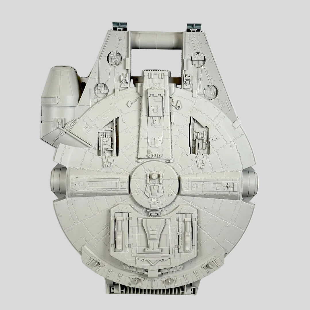 Model of the Millennium Falcon spaceship on a white background