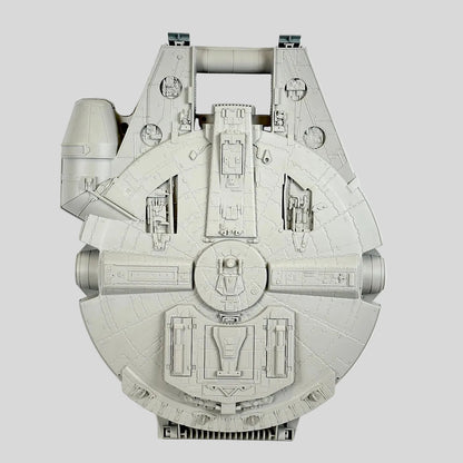 Model of the Millennium Falcon spaceship on a white background