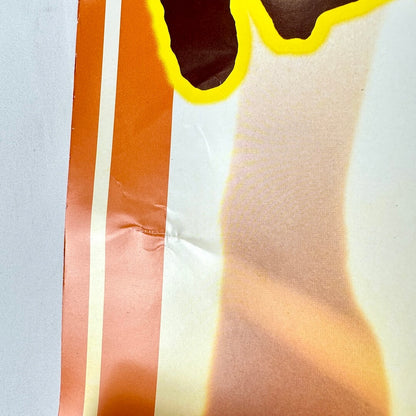 Close up of crease/dent to poster below artist name. 
