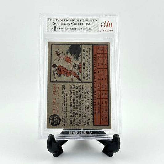 Vintage baseball card in a clear protective case on a white background