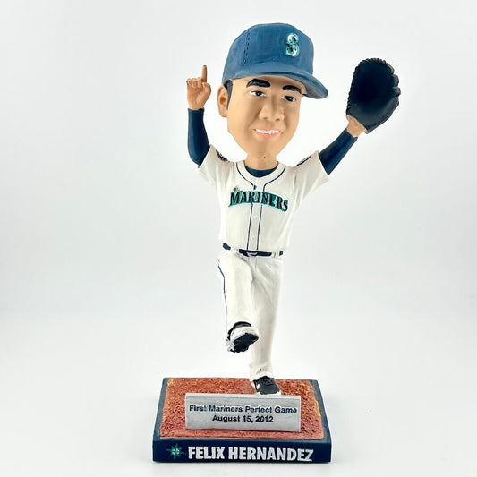 Bobblehead figure of a baseball player in a Mariners uniform with a glove and cap on a white background