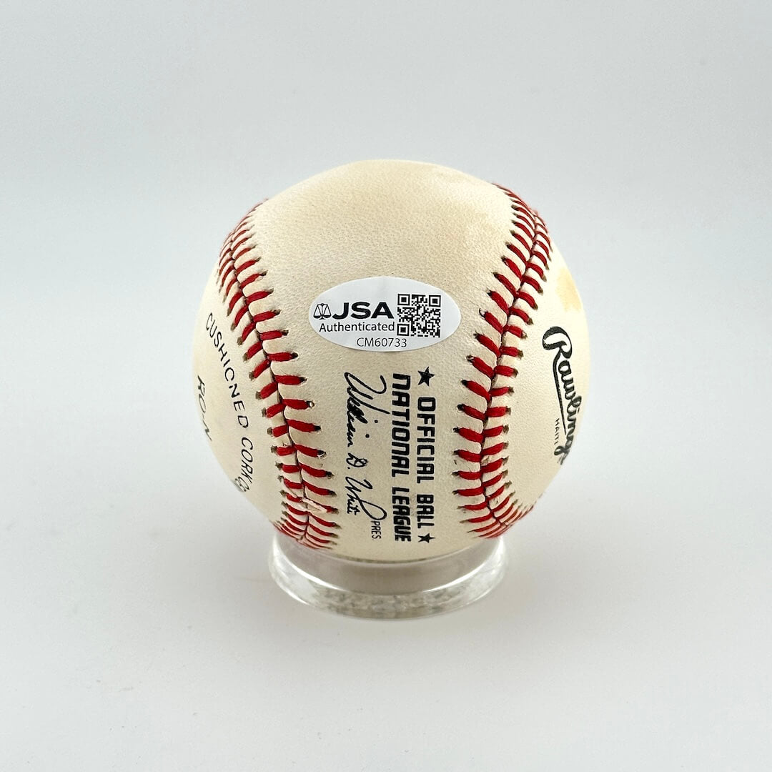 Baseball with JSA Authentication label on a white background