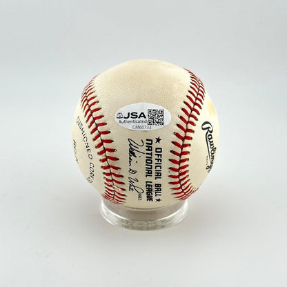 Baseball with JSA Authentication label on a white background