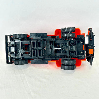 Underside of toy showing minimal wear to wears and gears. 