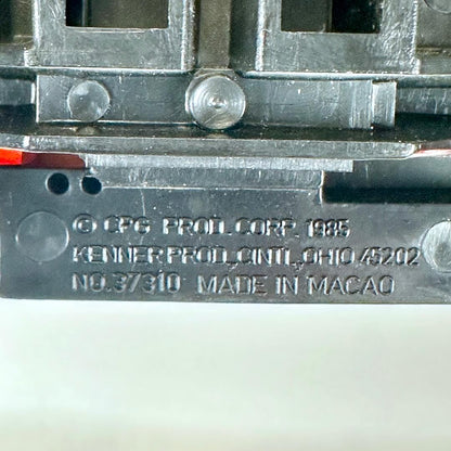 Close-up of copyright and maker information embossed on underside. 