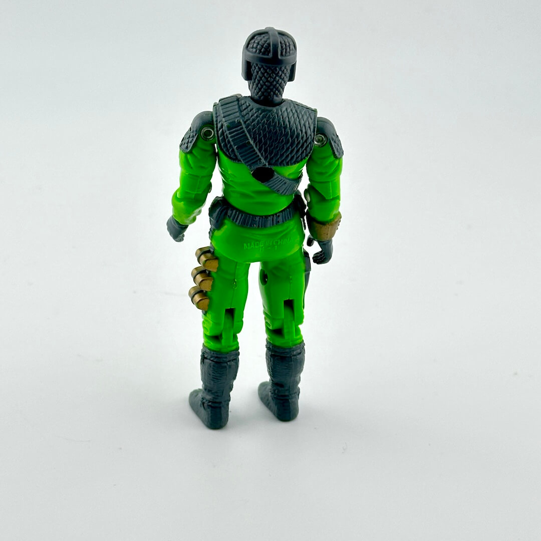 Green and black action figure on a white background