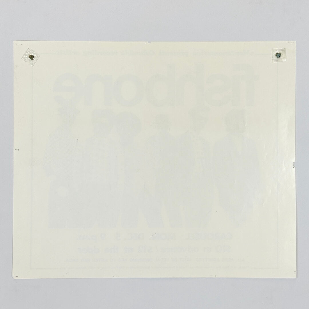 Backside of white poster against white background. 