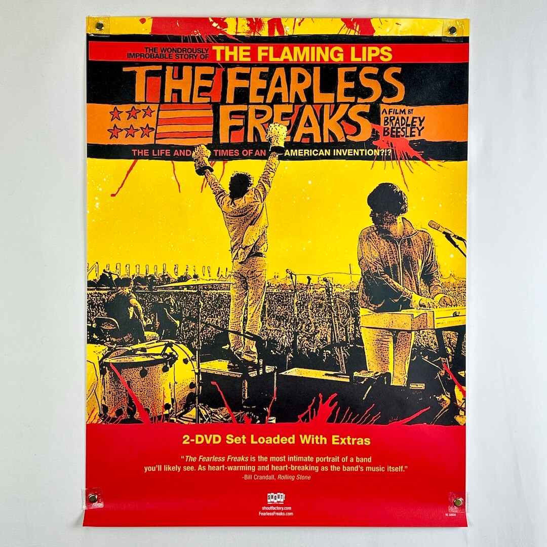Promotional poster for 'The Fearless Freaks' by The Flaming Lips featuring two musicians on stage.