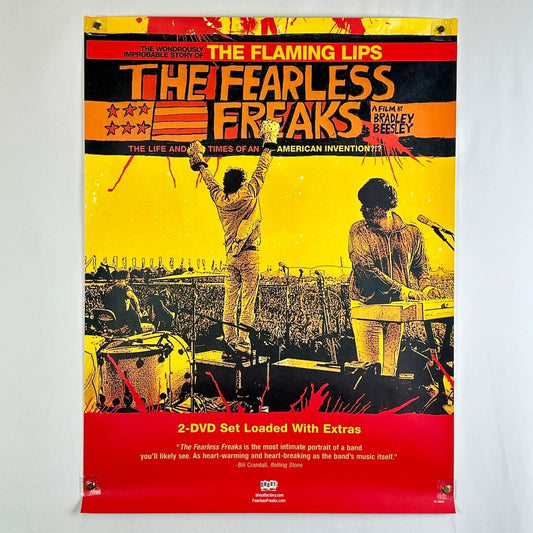 Promotional poster for 'The Fearless Freaks' by The Flaming Lips featuring two musicians on stage.