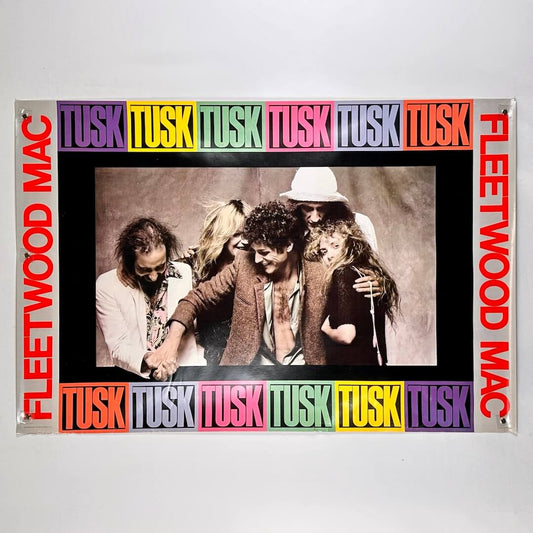 Fleetwood Mac poster of album cover for 'Tusk' with band members and colorful text on a white background