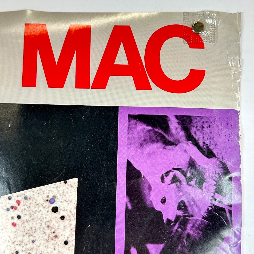 Top right corner of poster with crumpled edge