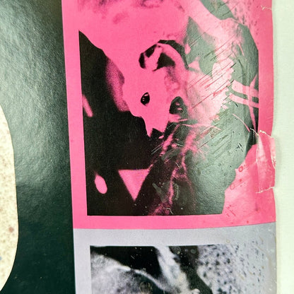 Right side of poster with two half inch tears