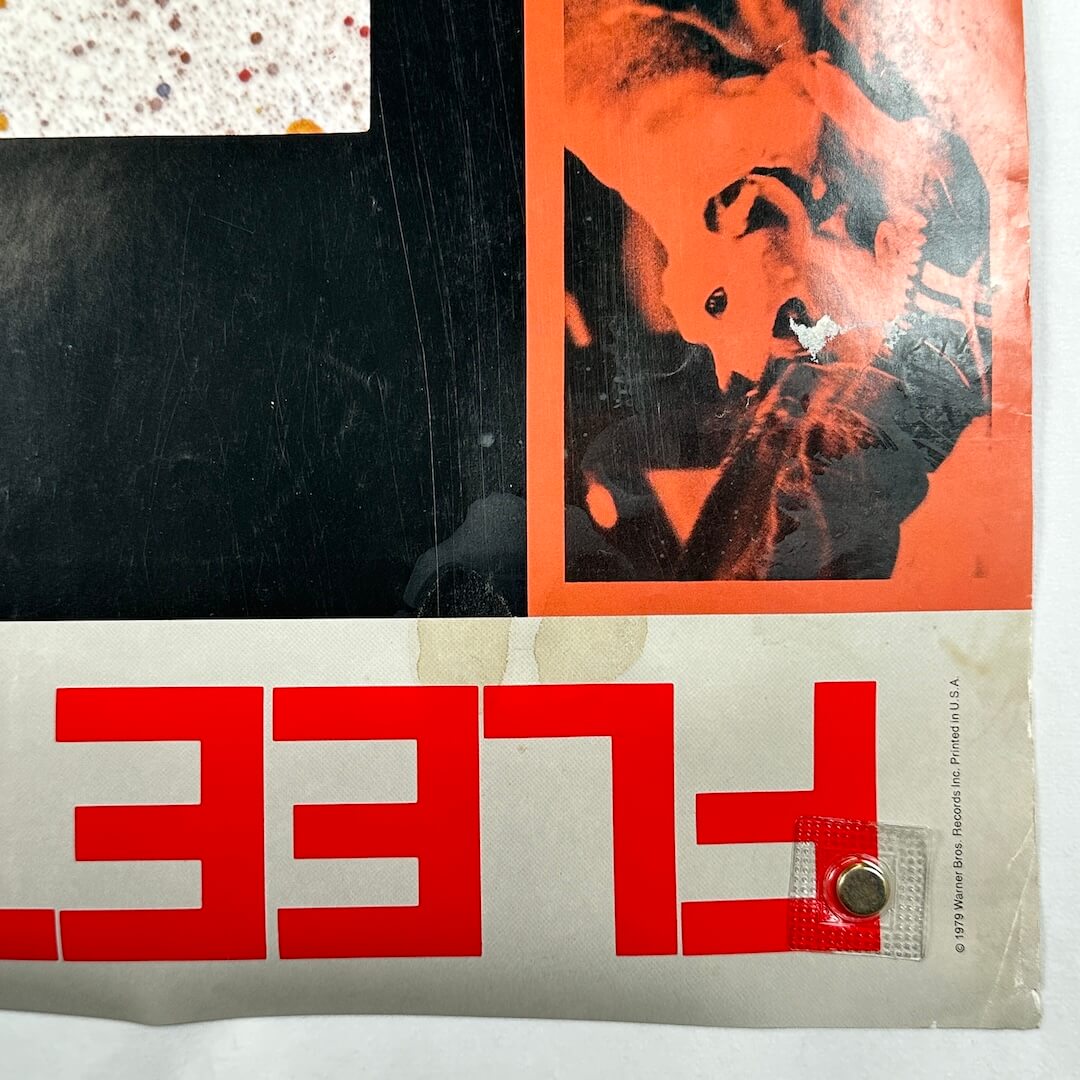 Bottom right corner with some water marks and creased corner.