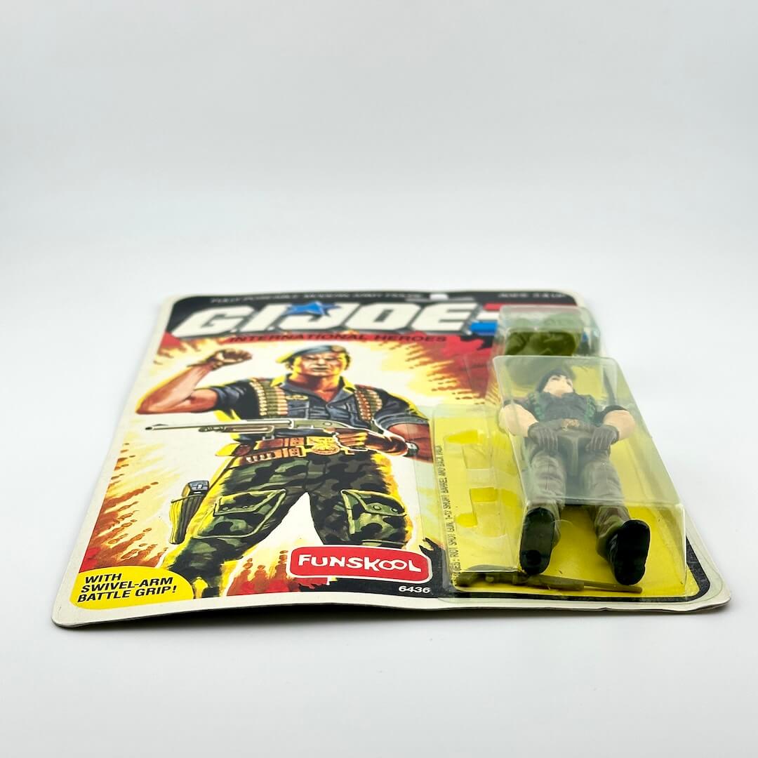 GI Joe action figure in packaging against white background. 