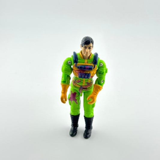 Toy figure in a green and orange outfit on a white background