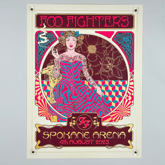 Foo Fighters concert poster with a stylized illustration of a woman in a colorful dress on a gray background