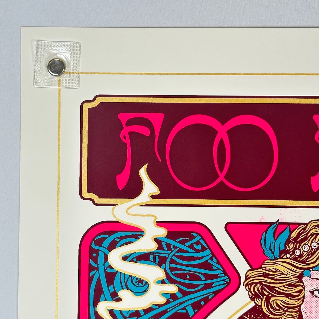 Top left corner of poster showing no damage to corner or edges. 