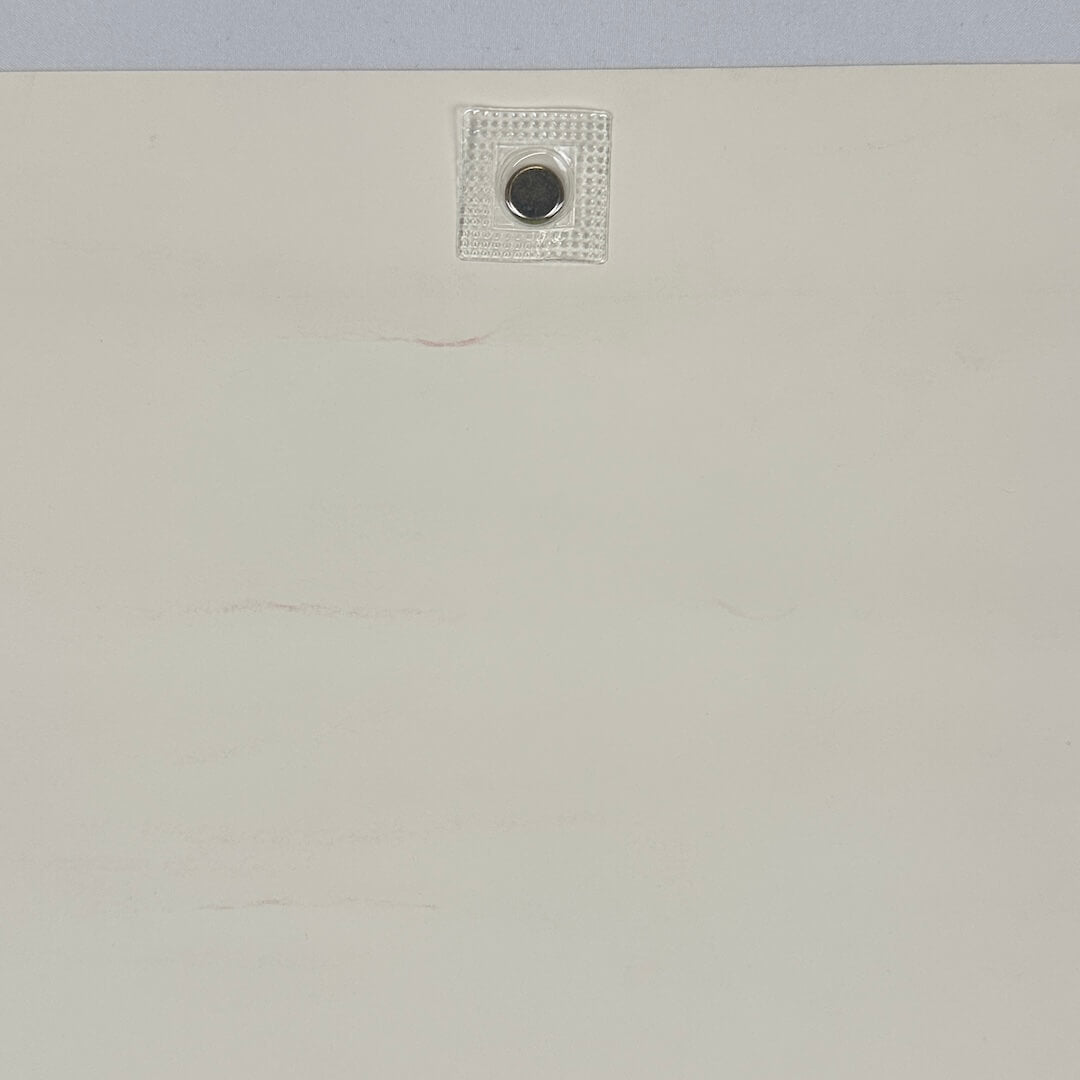 Ink transfer at top center of poster.
