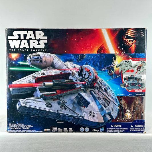 Star Wars Force Awakens Millennium Falcon in packaging with image of Falcon in battle scene on box. 