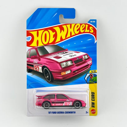 Hot Wheels packaging with pink Ford Sierra in original blister. 