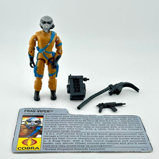 Toy figure of a character in orange and blue suit with accessories on a white background