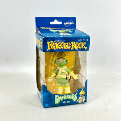 Small toy figure in blue and green box with "Fraggle Rock" branding against white background. 
