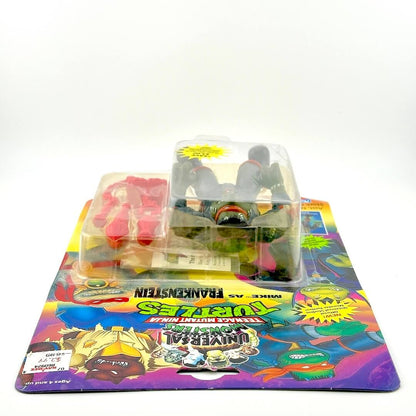 Toy figure in clear packaging on a colorful display card with branding.